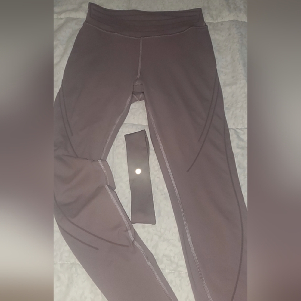 LULULEMON light purple leggings and matching headband.